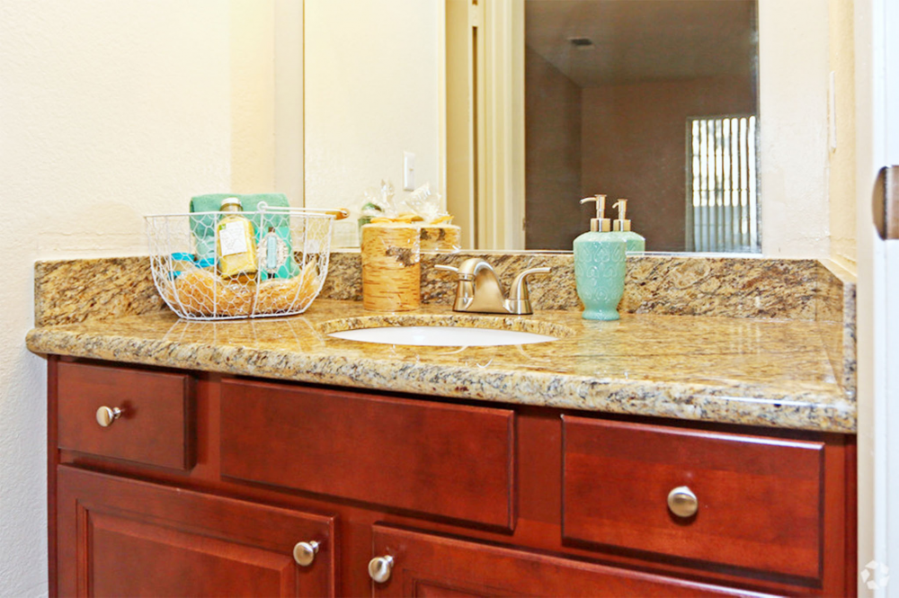 This image is the visual representation of Bedroom and bathroom 2 in Walnut Village Apartments.